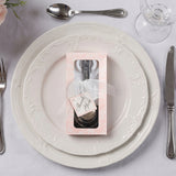 Elegant thank you gift box on a dinner plate setting.