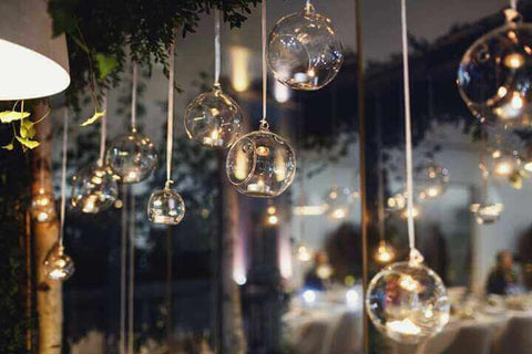 Hanging glass globe lights at reception