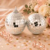 Silver mirrored disco ball ornaments with rose gold confetti and flowers