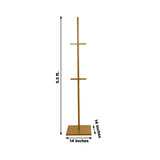 Gold metal coat rack, 5.5 ft tall, 14-inch base, studio isolation shot.