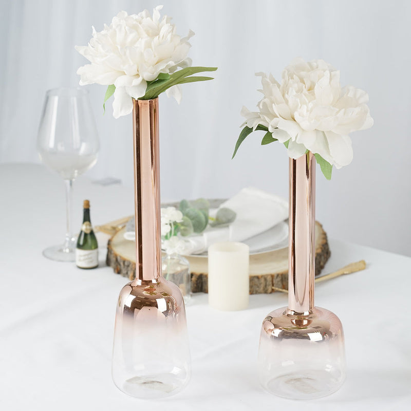 Rose gold vase with white flowers
