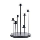 Black modern multi-arm candle holder on round base#whtbkgd