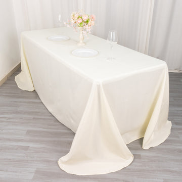 90"x132" Ivory Seamless Polyester Round Corner Rectangular Tablecloth
