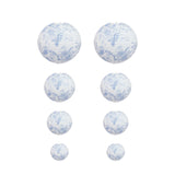 Blue floral paper lanterns in various sizes on a white background #whtbkgd