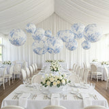 Elegant blue and white decorative lanterns in a beautifully arranged dining space.