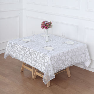 Add Opulence and Allure with the Silver Sequin Leaf Embroidered Tulle Table Overlay
