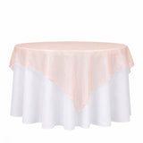 Pink and white round tablecloth overlay on round table