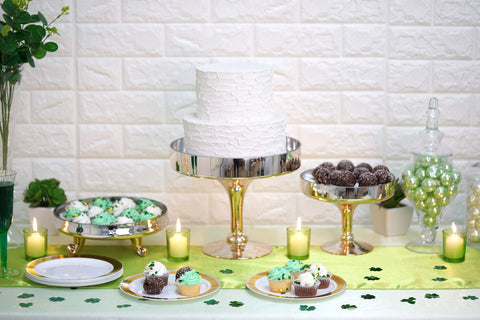 Dessert display with cake stands and cupcakes