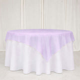 Lavender sheer table overlay on round white table with draped backdrop