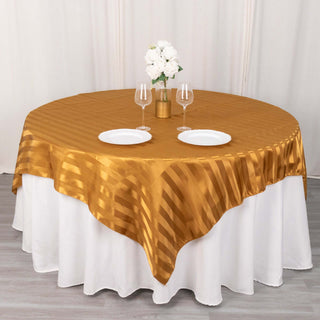 Elevate Your Event with the Gold Satin Stripe Table Overlay