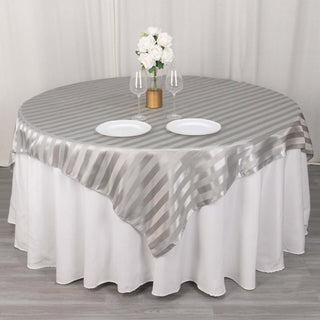 Elevate Your Event Decor with the Silver Satin Stripe Square Table Overlay