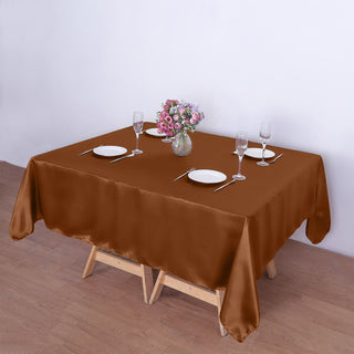 Experience Unparalleled Elegance with the Cinnamon Brown Satin Square Table Overlay