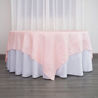 Elevate Your Wedding Decor with the Blush Accordion Crinkle Taffeta Square Table Overlay