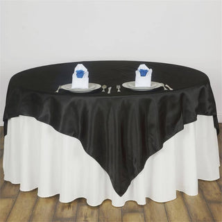 Add Elegance to Your Event with the Black Satin Table Overlay