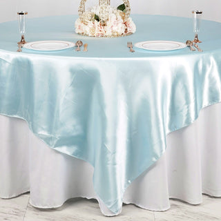 Experience Luxury with the Light Blue Seamless Satin Square Table Overlay