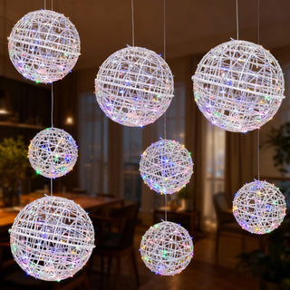 Decorative hanging lighted spheres for festive decor.