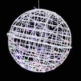 Illuminated decorative globe with colorful lights on a black background. #whtbkgd