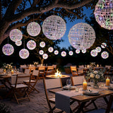 Outdoor string lights creating a magical ambiance for an evening gathering.