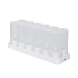 Set of 12 frosted LED candles on a white charging base #whtbkgd
