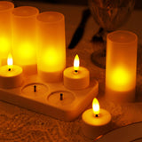 LED flameless candles with warm glow on a table setting.