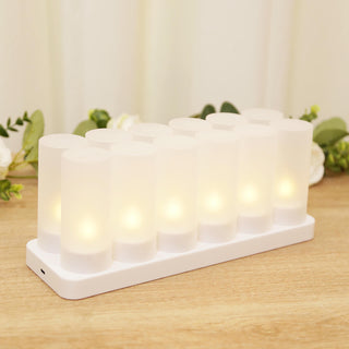 White LED candle set on a wooden surface, creating a warm ambiance.