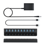USB hub with power adapter and cables on a white background