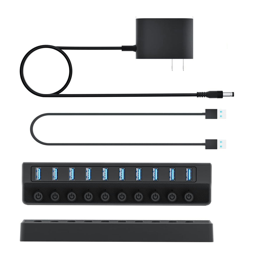 USB hub with power adapter and cables on a white background