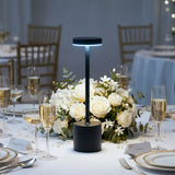 LED wireless table lamp centerpiece at an elegant wedding reception table
