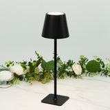 Black table lamp with a minimalist design and a round shade.
