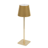 Gold pleated lamp with a square base on a white background. #whtbkgd