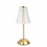 Gold table lamp with clear glass pleated shade and brass base