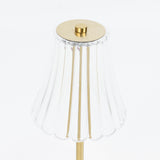 Clear glass and gold scalloped lamp shade close-up