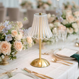 Elegant gold table lamp with floral wedding table centerpiece setting