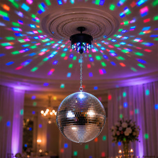 Disco ball with colorful ceiling light reflections in party venue