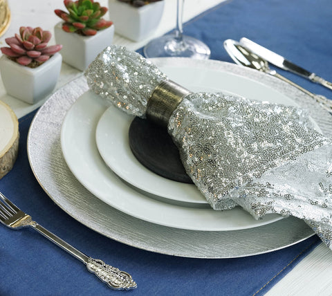 Silver napkin wrapped with decorative bow