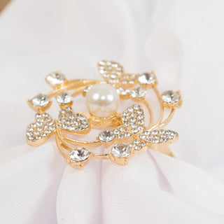 <h3 style="margin-left:0px;"><span style="background-color:transparent;color:#000000;">Intricate Gold Metal Napkin Rings With Butterfly Wreath Design</span>