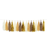 Tassel garland in gold, cream, and brown colors for festive decor #whtbkgd