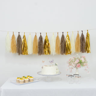 Decorative tassel garland in gold, cream, and brown for party decor.