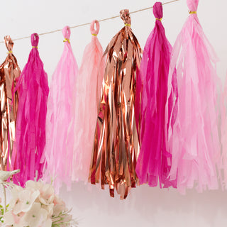 Pink and gold tassel garland decoration for parties and celebrations.