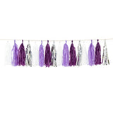 Purple and silver tassel garland for party decorations #whtbkgd