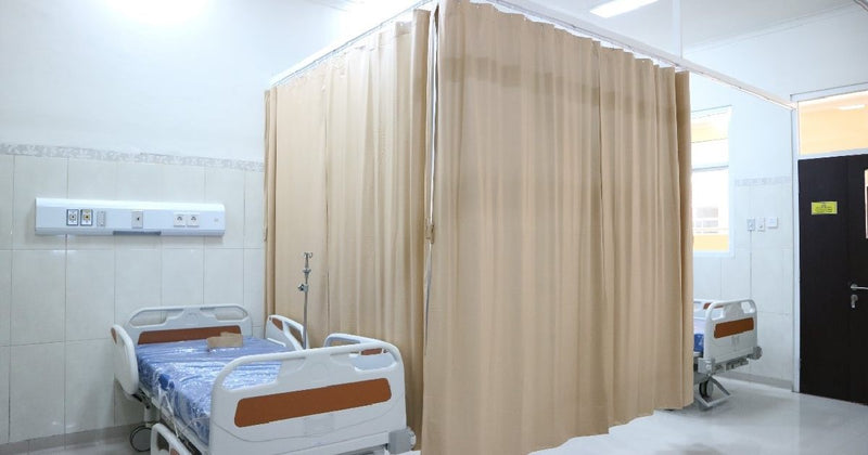 Hospital bed cubicles with privacy curtains