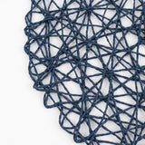 Blue woven rattan placemat with geometric lattice pattern