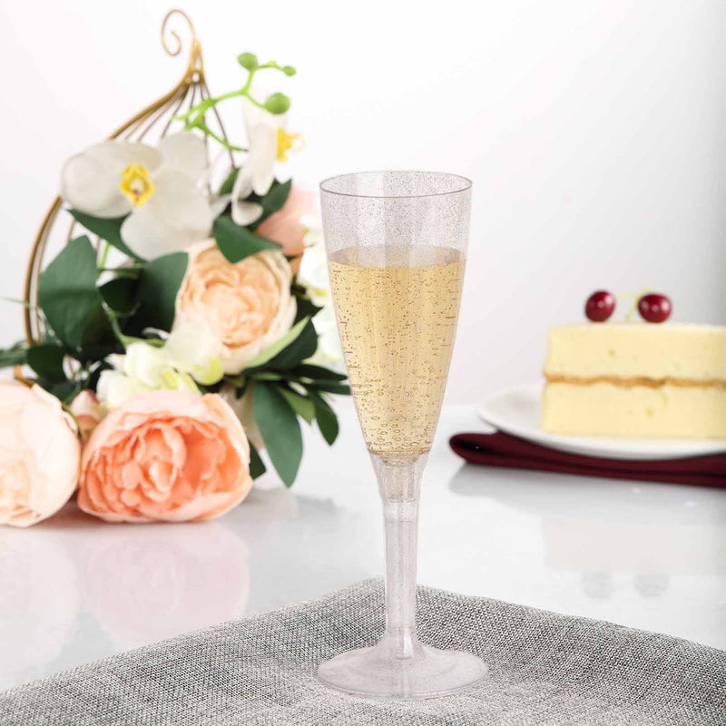 Plastic champagne flute with bubbles