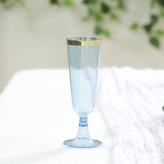 <h3 style="margin-left:0px;"><span style="background-color:rgb(255,255,255);color:rgb(29,31,37);">Elegant Dusty Blue Champagne Flutes with Gold Rim</span>