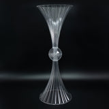 Clear acrylic vase with fluted design and spherical accent.