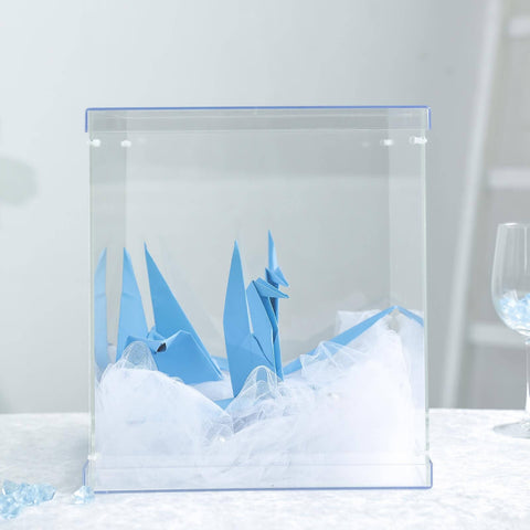 Acrylic box with floral arrangement and gold centerpiece
