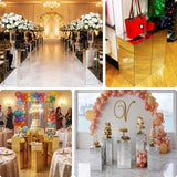 Event decor featuring floral arrangements, stylish bags, and elegant cake displays.