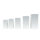 Set of five white display pedestals in varying heights for showcasing products #whtbkgd