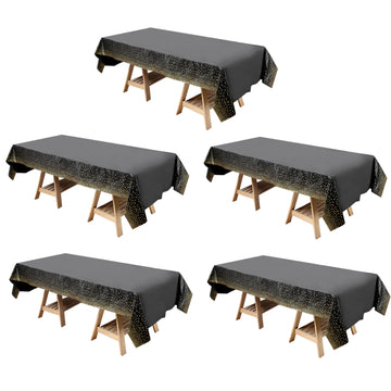 5 Pack Black Rectangular Waterproof Plastic Tablecloths with Gold Confetti Dots, 54"x108" Disposable Table Covers