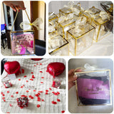 Gift boxes and decorations for a special celebration with hearts and rose petals.